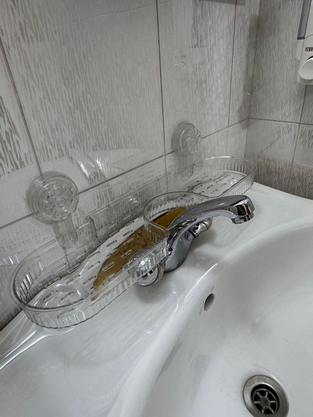 نظم دهنده پشت شیر روشویی